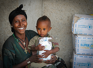 Mother and a child with wfp food